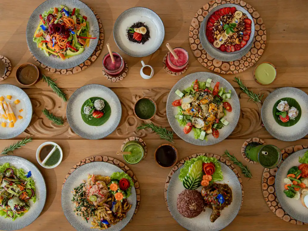 A beautifully presented table with colorful plant-based dishes