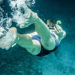 Colorful coral reefs and marine life during a snorkeling adventure in Amed