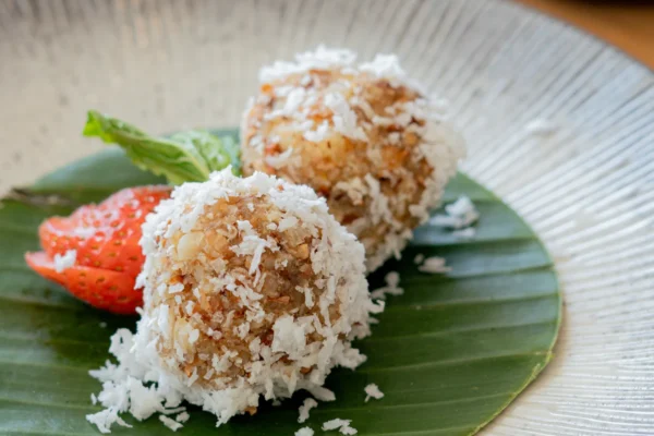 Getuk is a traditional Indonesian food made from grated cassava and sprinkled with grated coconut.