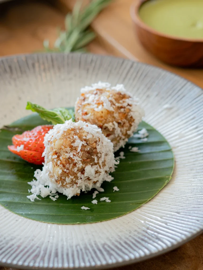 Getuk is a traditional Indonesian food made from grated cassava and sprinkled with grated coconut.