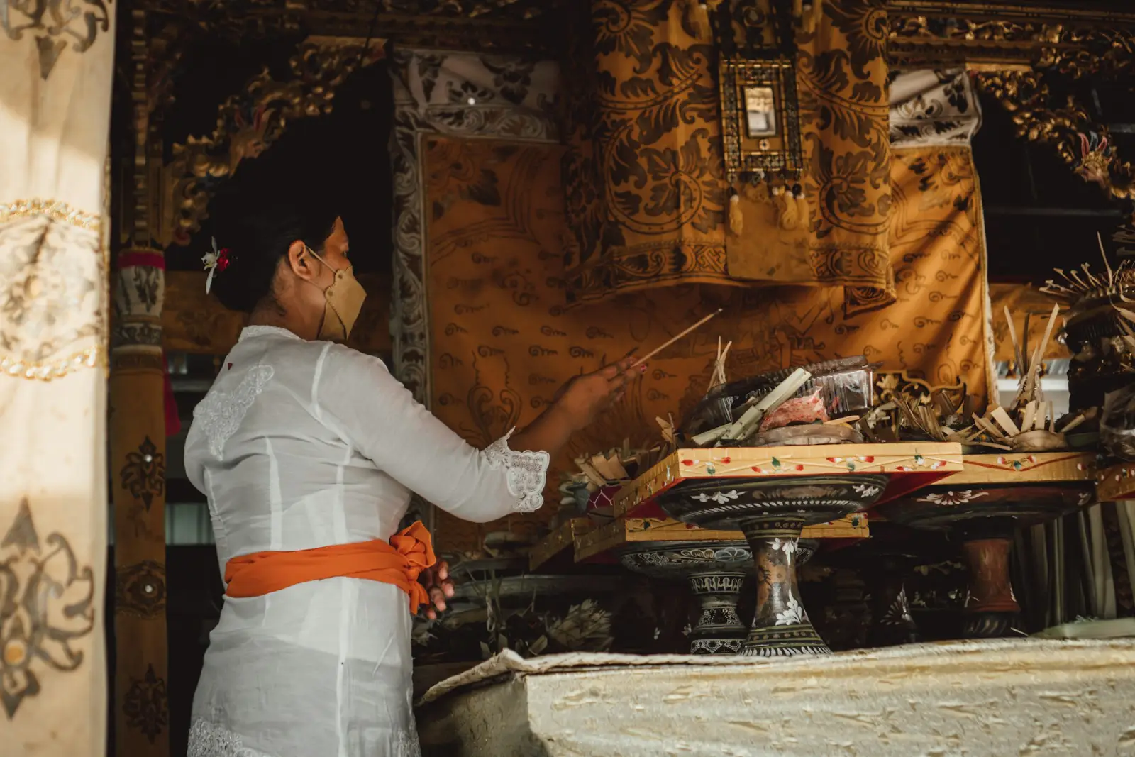 Balinese Pray Using Canang and Dupa