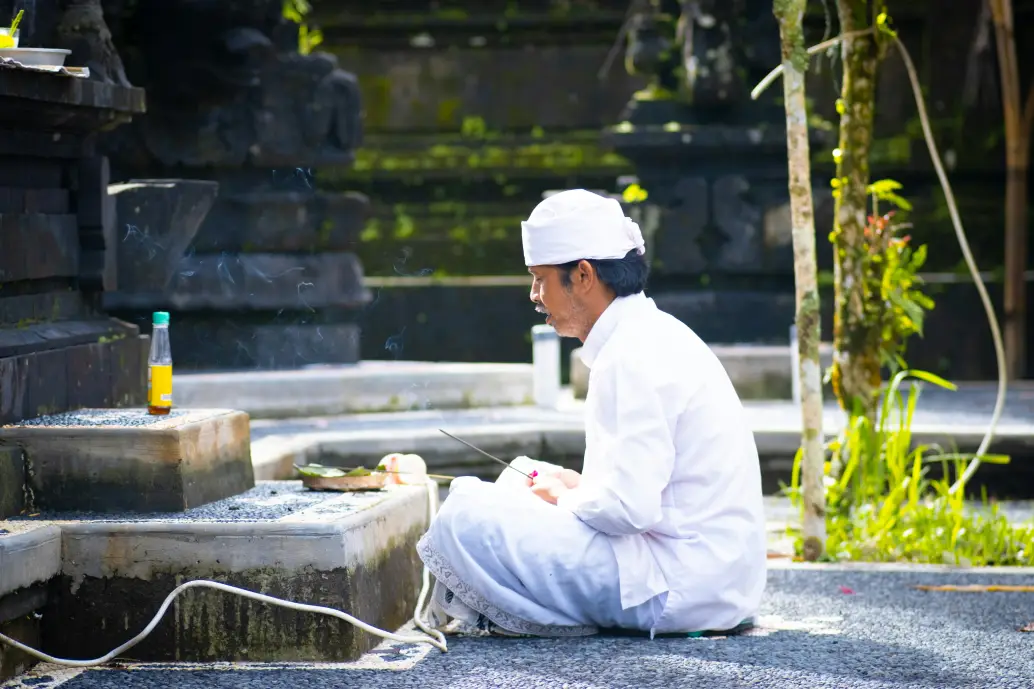 Healers and traditional ceremonies at a Bali retreat, featuring spiritual rituals and wellness practices