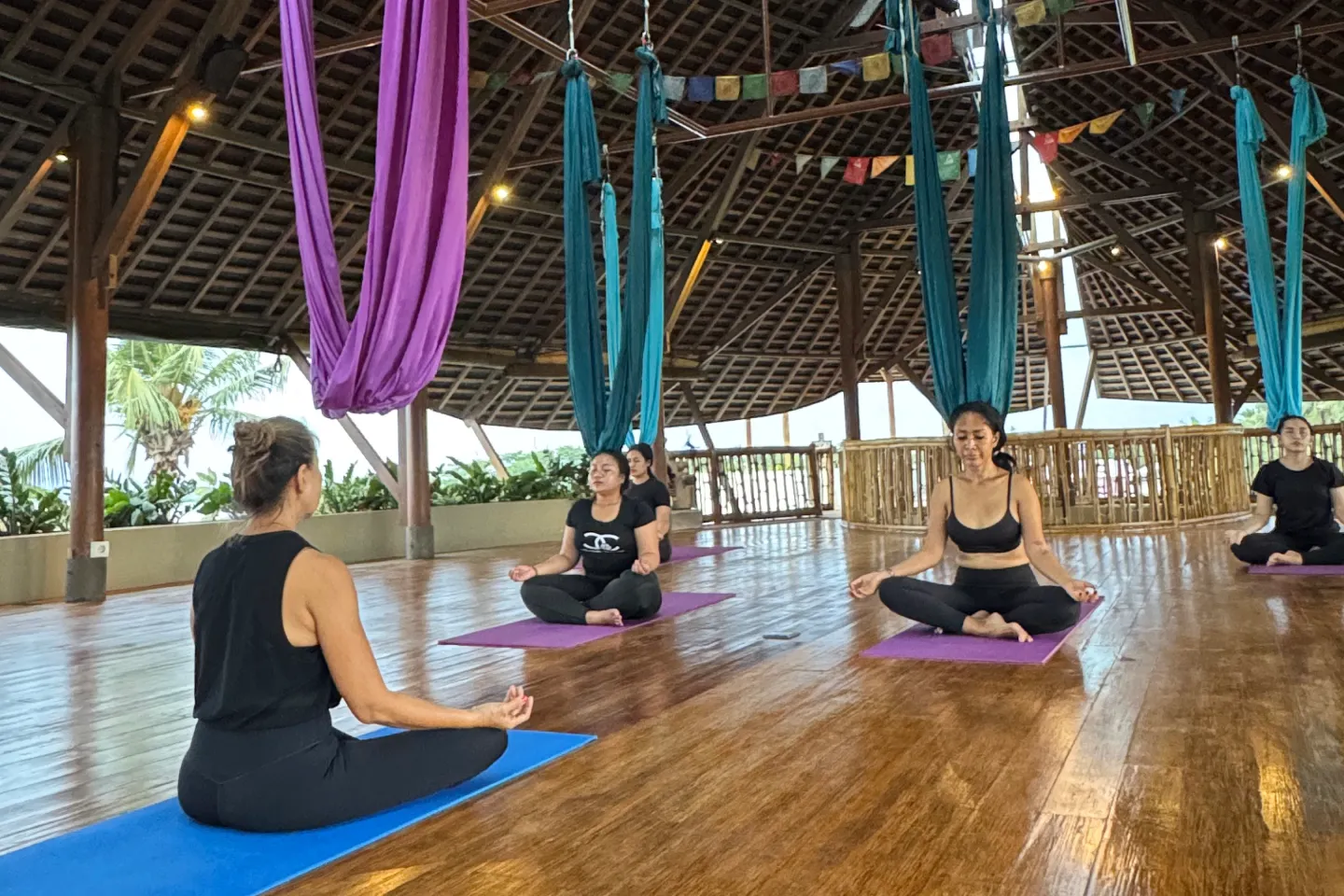 A group of woman doing meditation